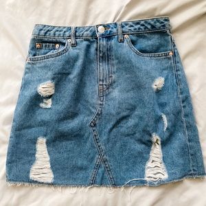Ripped denim skirt